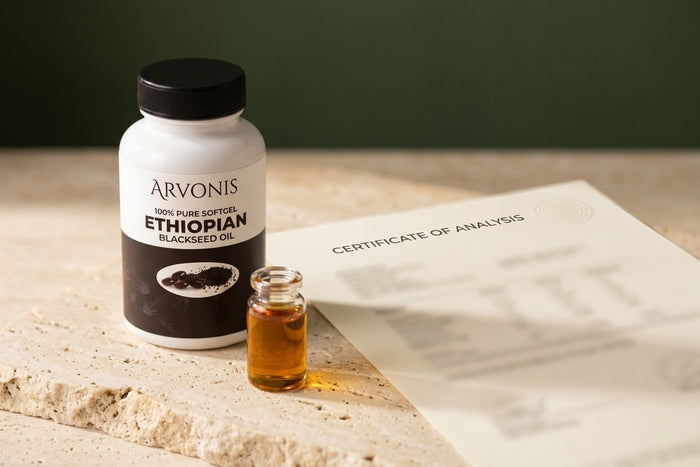 A sealed laboratory sample vial beside a folded report